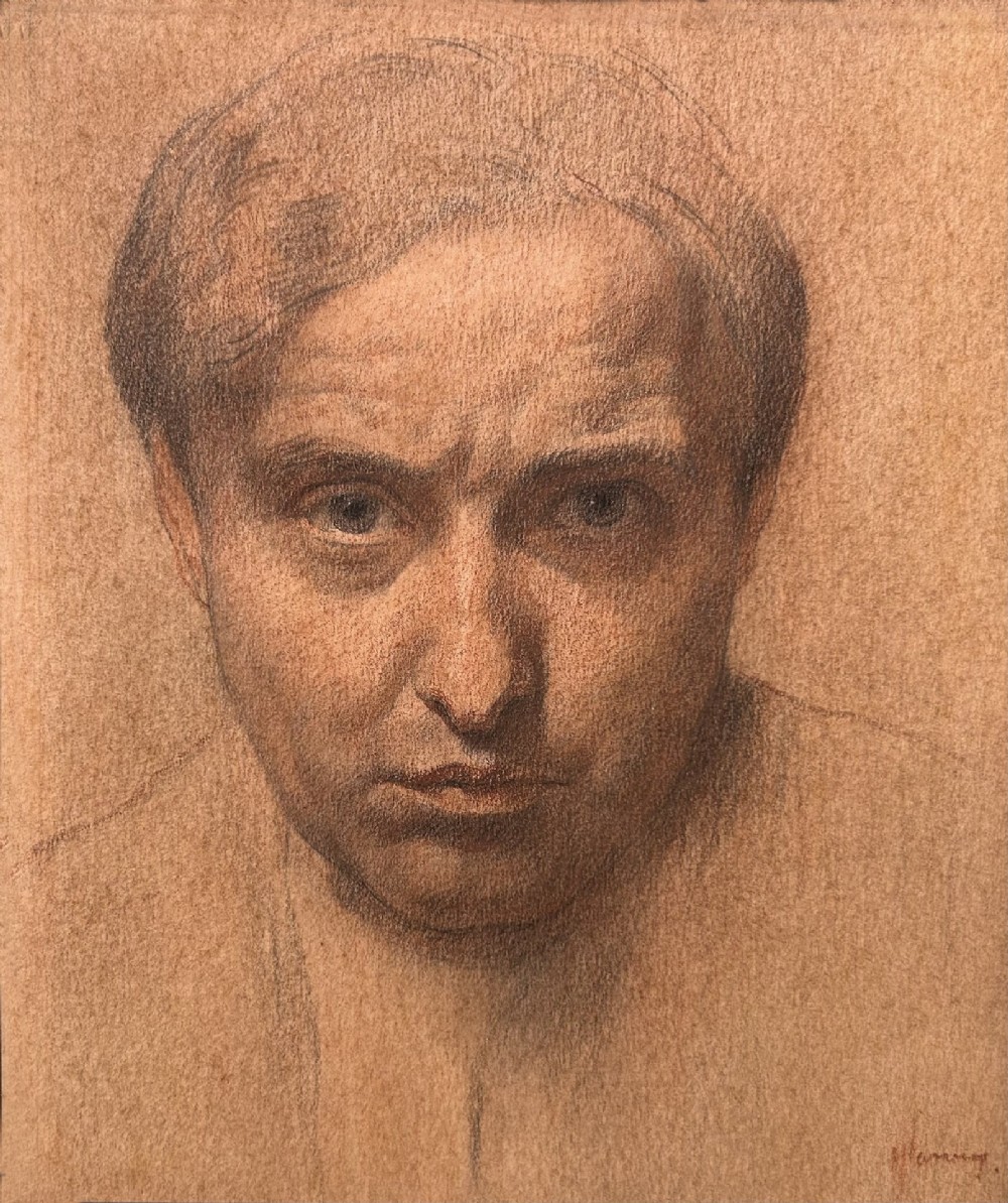 A monochrome warm brown chalk and charcoal self-portrait study depicting a mans face looking directly forward on textured paper.