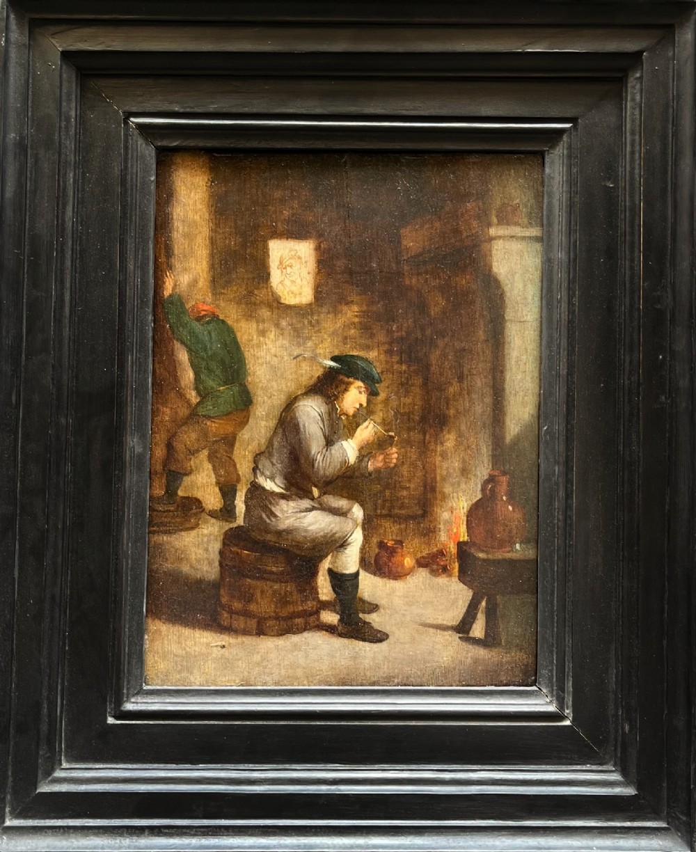 An oil painting depicting a seated man in a feathered cap lighting a pipe beside a fire, with a barrel beneath him and another figure standing in the background. View II