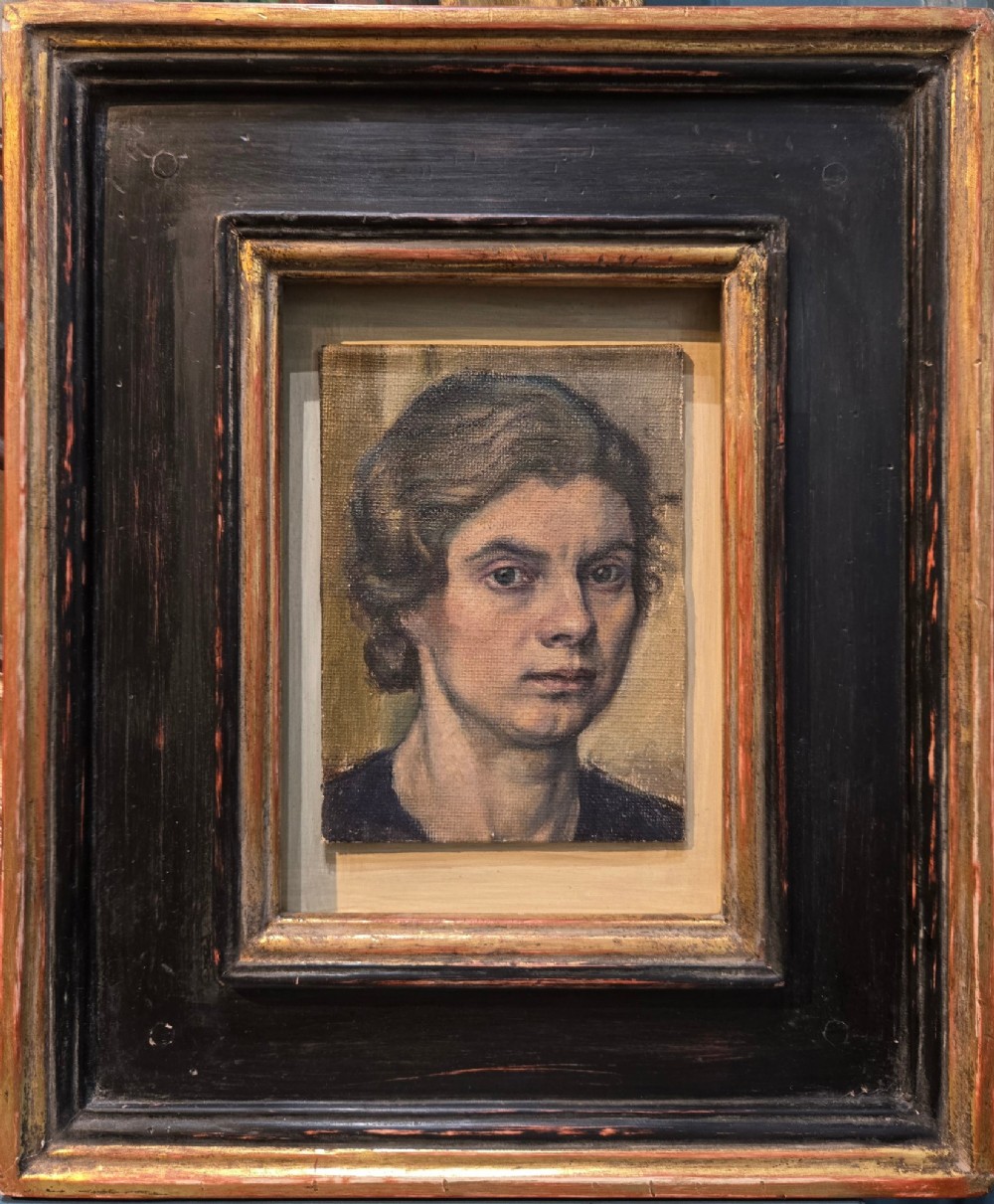 An oil painting on coarse canvas depicting a close-up self-portrait study of a woman with short waved hair looking forward. View II