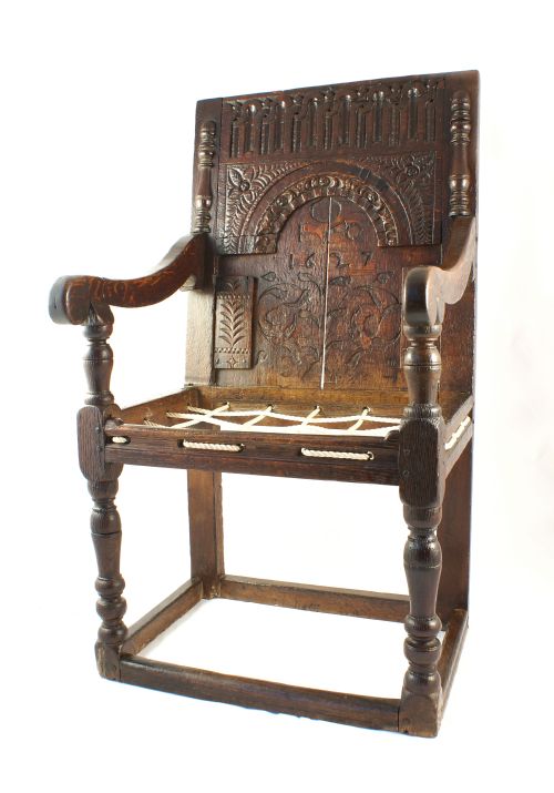 A Rare Early 17th Century Oak Inlaid Armchair