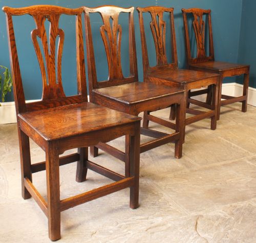 A Set of Four Georgian Oak Dinning Chairs.