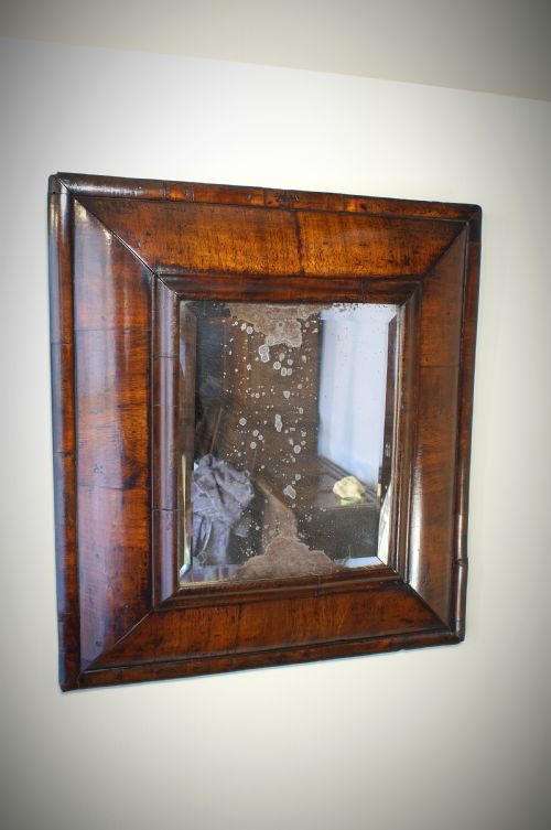 A 17th Century William and Mary Walnut Cushion Moulded Mirror