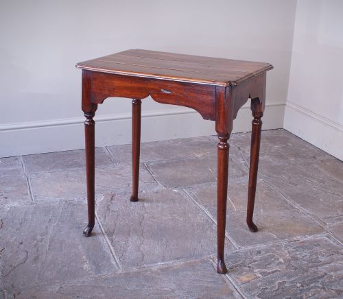 A SMALL EARLY 18THCENTURY FRUITWOOD CENTRE TABLE