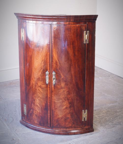 George III Inlaid Mahogany Bow Front Corner Cupboard