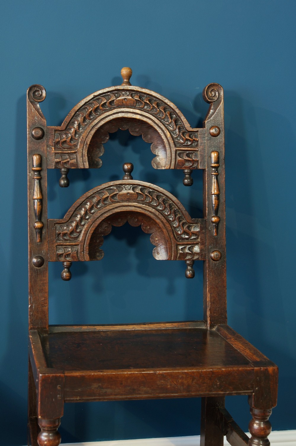 A pair of 17th century oak backstools View III