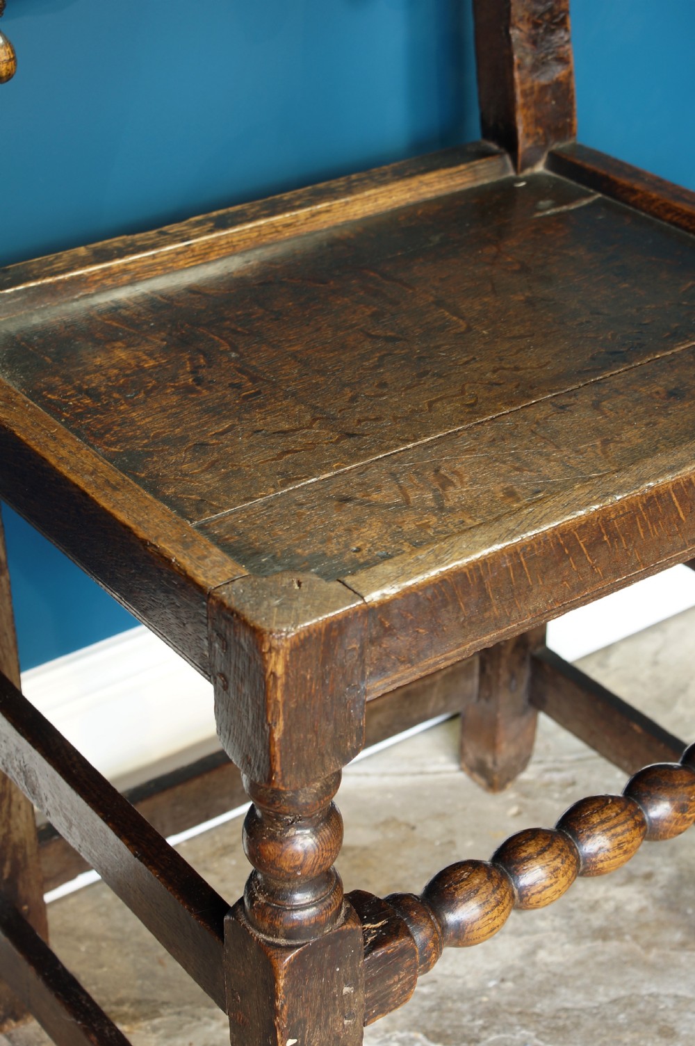 A pair of 17th century oak backstools View IV