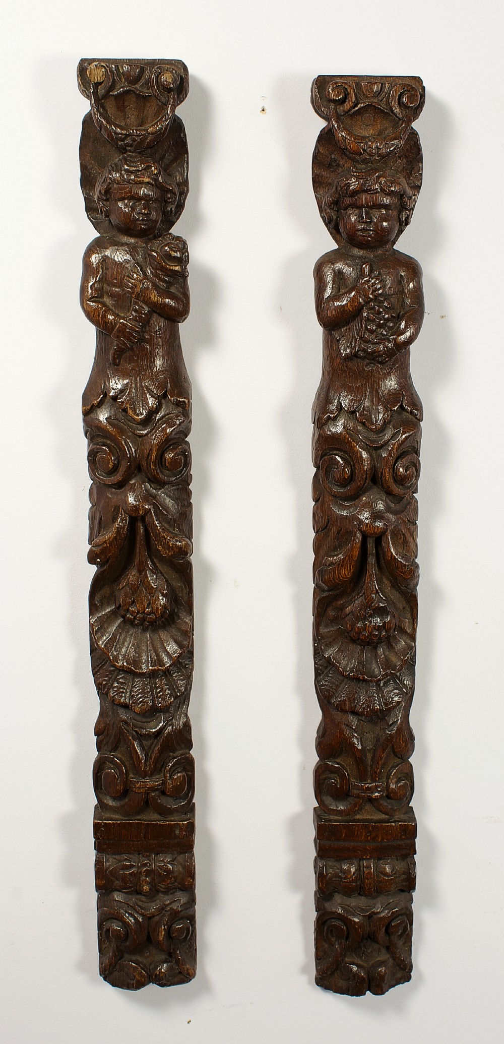 Pair of 17th century carved caryatids