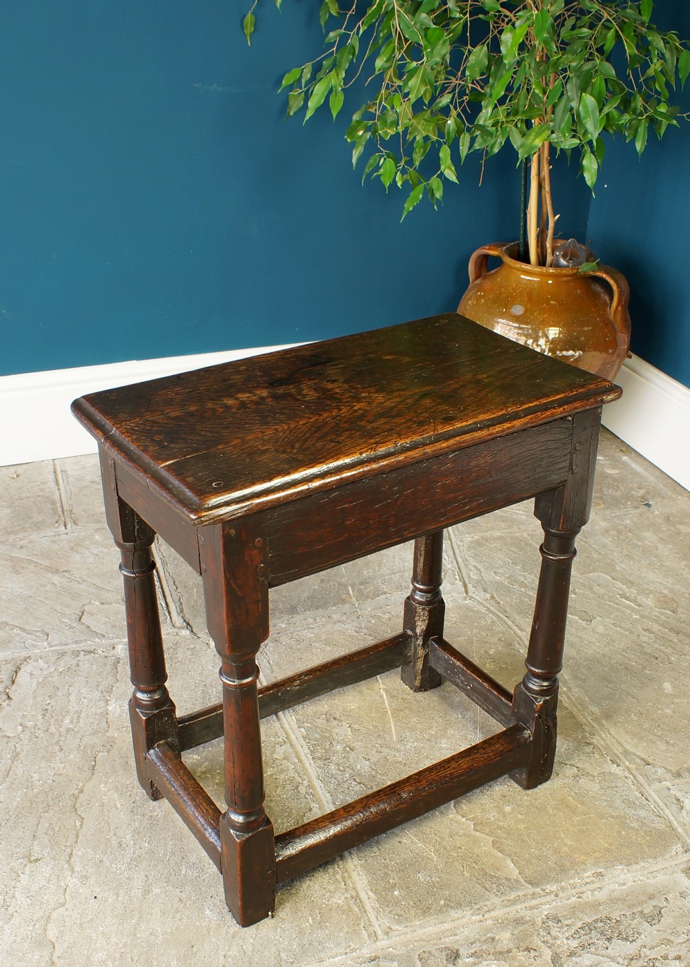 A 17th Century Oak and Fruitwood joint stool