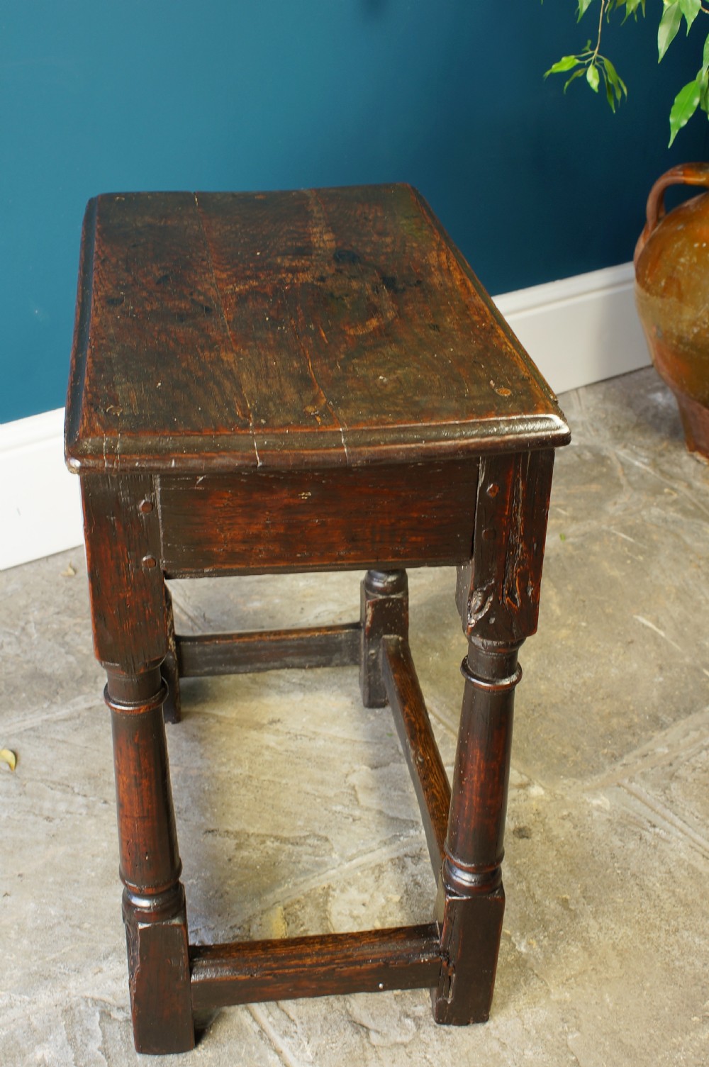 A 17th Century Oak and Fruitwood joint stool View III
