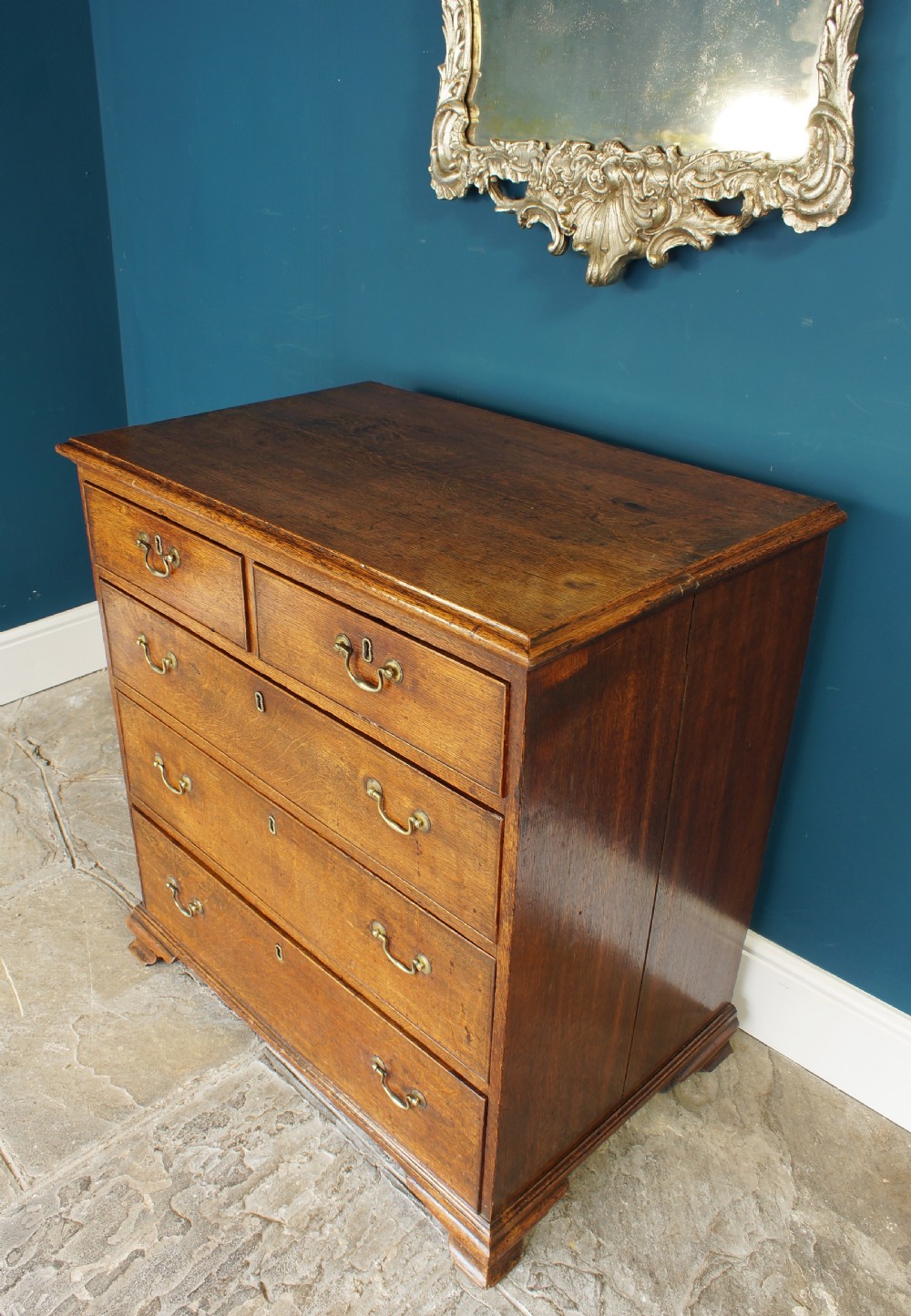 A small Georgian Oak chest of drawers. View VII