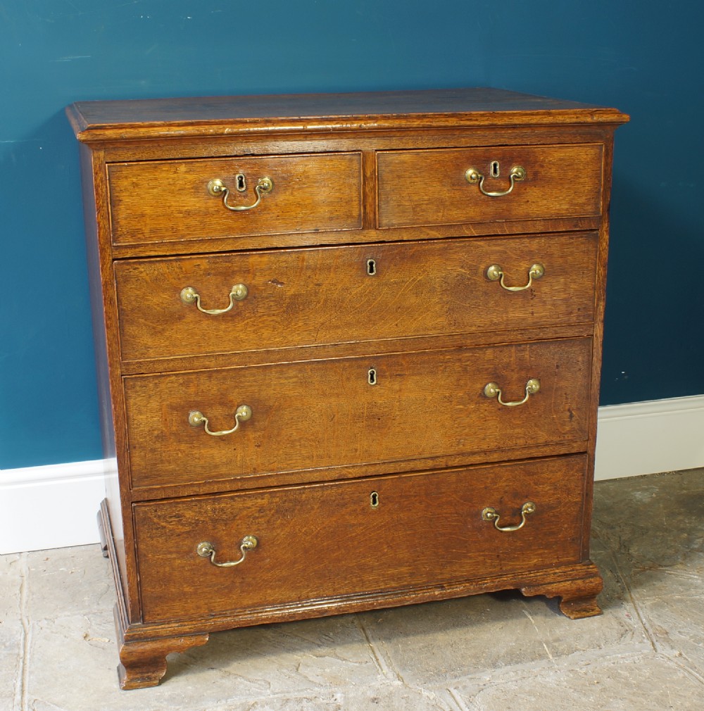 A small Georgian Oak chest of drawers. View XII