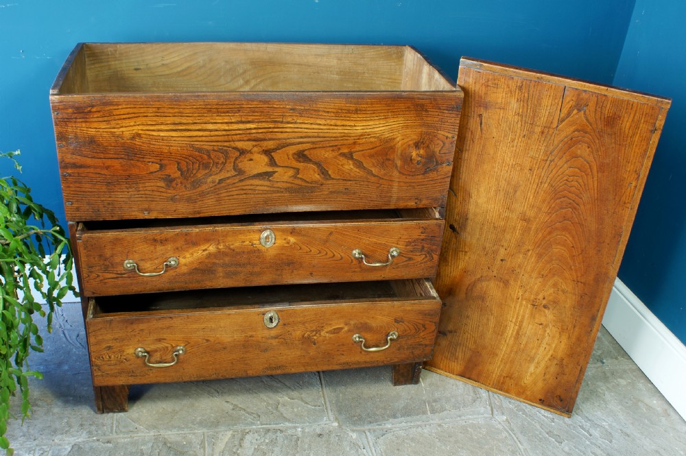 A Georgian elm mule chest featuring a hinged top lid over two wide drawers with brass swan-neck handles. View XIII