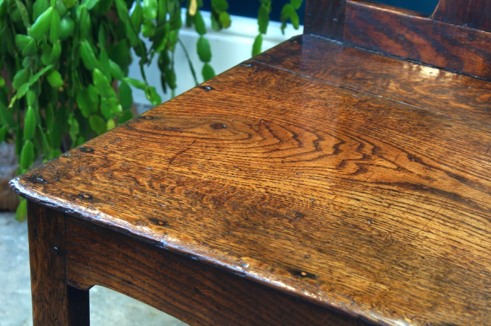 A set of four Georgian oak dinning chairs. View III