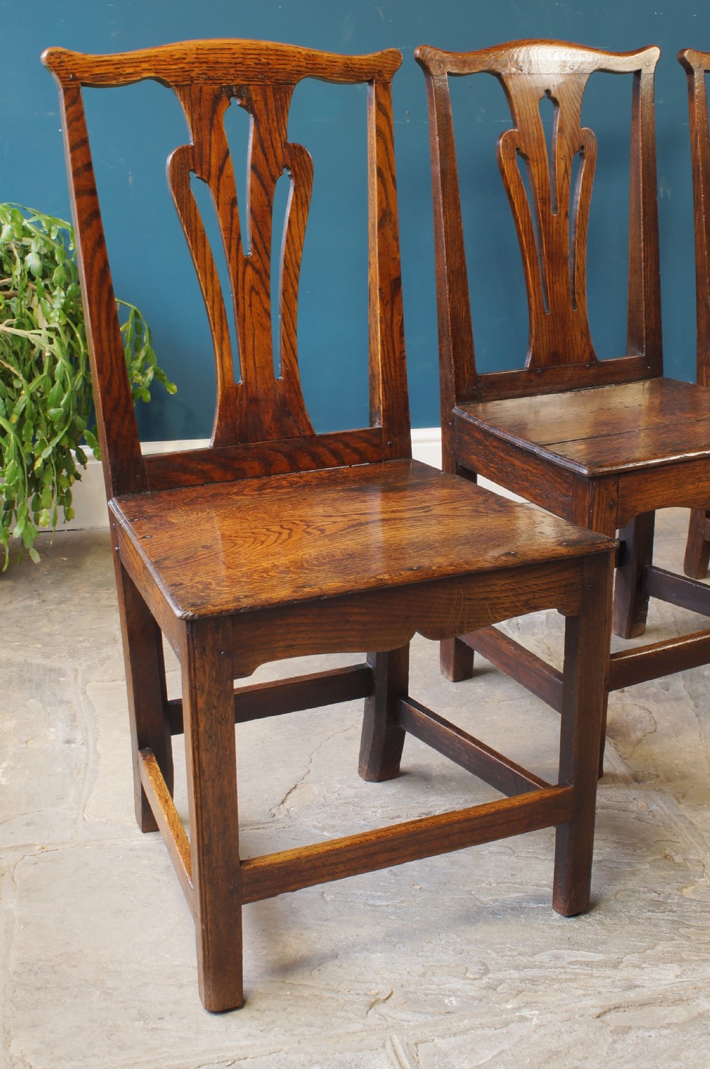A set of four Georgian oak dinning chairs. View VII