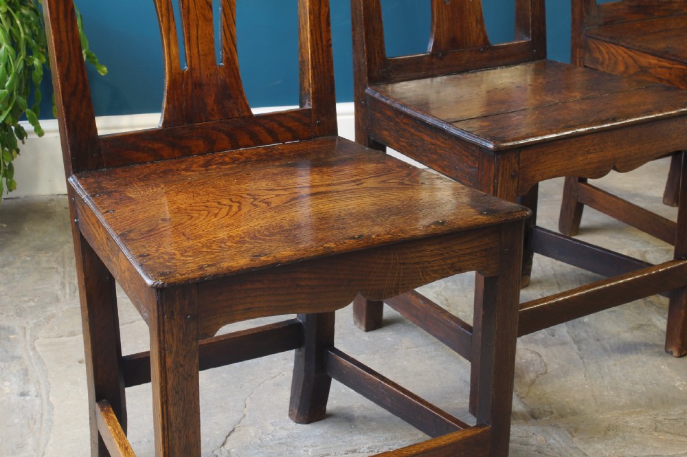 A set of four Georgian oak dinning chairs. View VIII