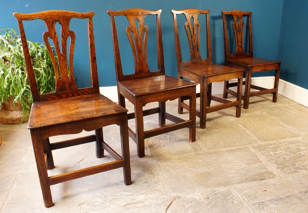 A set of four Georgian oak dinning chairs. View IX