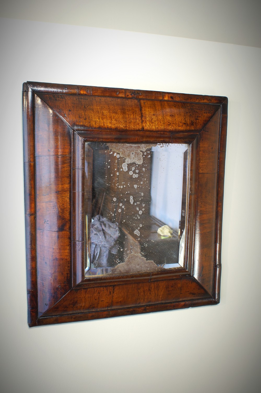 A 17th Century William and Mary Walnut Cushion Moulded Mirror