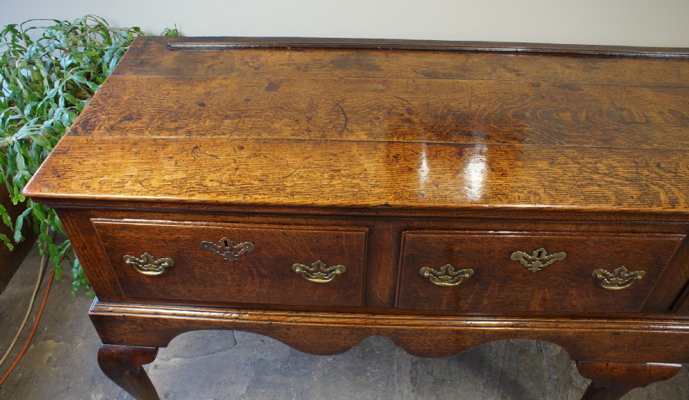 An 18th Century Oak Four Drawer Dresser Base. View IX