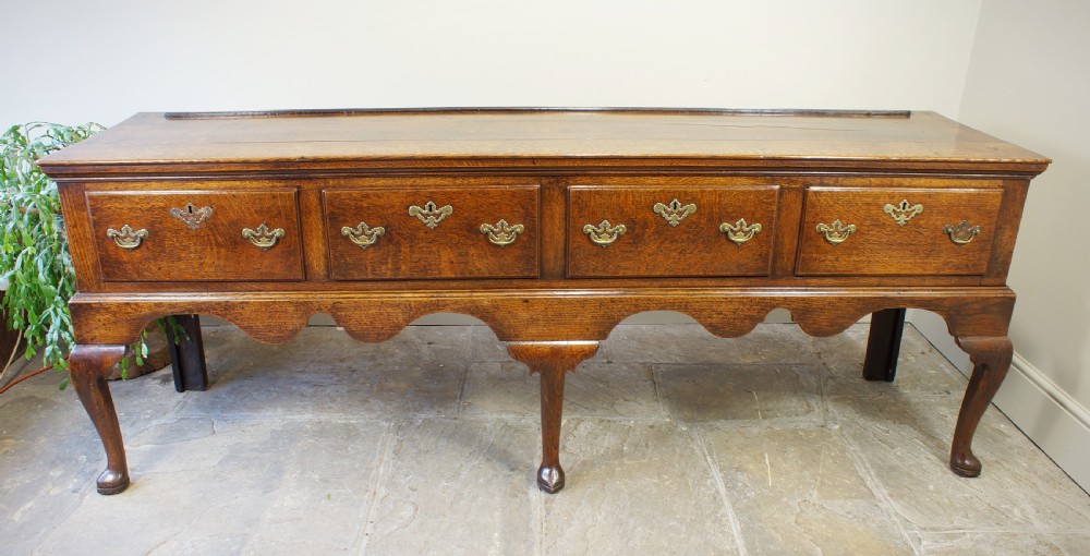 An 18th Century Oak Four Drawer Dresser Base. View XI