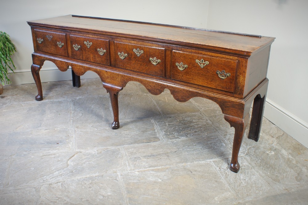 An 18th Century Oak Four Drawer Dresser Base. View XIII