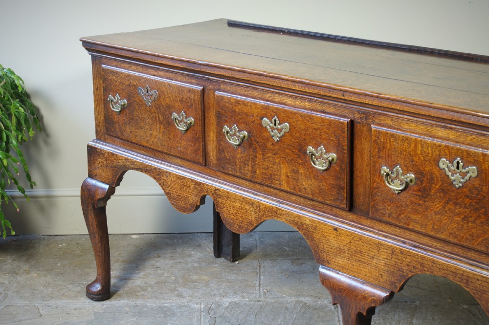 An 18th Century Oak Four Drawer Dresser Base. View XVII