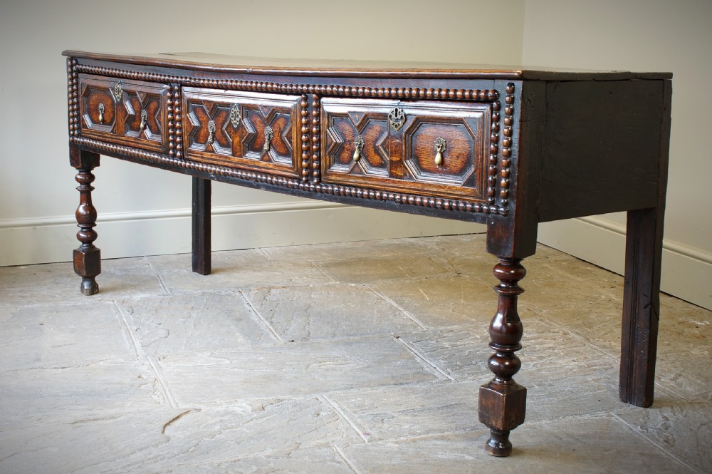 17th Century Moulded Oak Dresser base.  View VIII