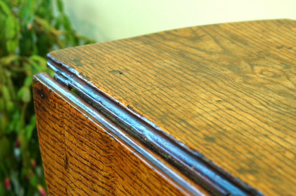 A small 17th-century oak gateleg table with two drop leaves, turned legs, and lower box stretchers. View VIII