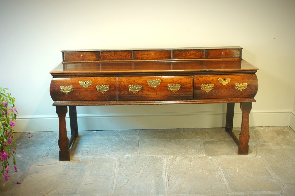 A Rare Late 17th Century Elm Dresser. View VIII