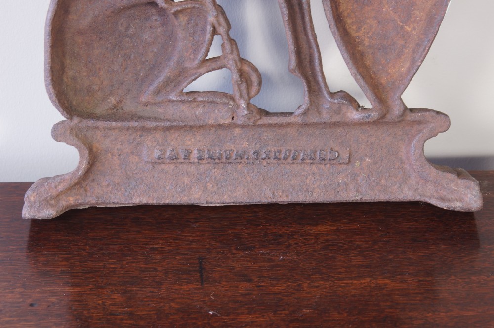 A country house cast iron armorial doorstop View VI