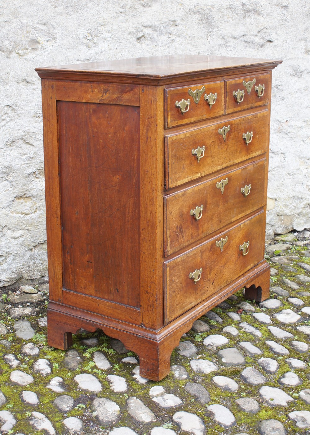 A Small Early Georgian Solid Walnut Chest Of Drawers. View IV