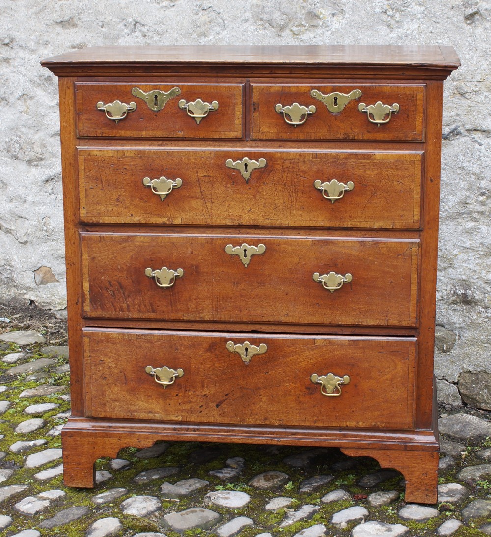 A Small Early Georgian Solid Walnut Chest Of Drawers. View V