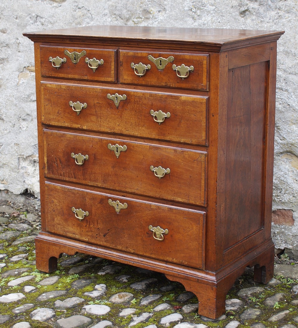 A Small Early Georgian Solid Walnut Chest Of Drawers. View VI