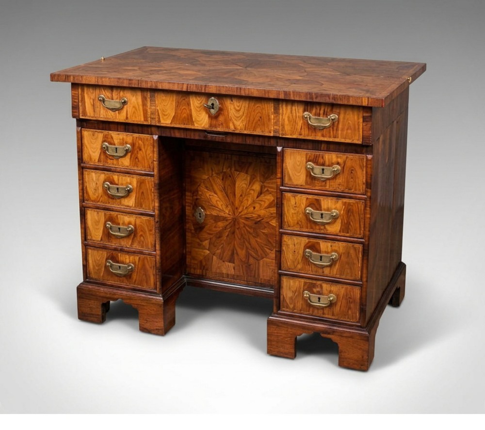 A William and Mary Kingwood oyster veneered kneehole secretaire desk View II