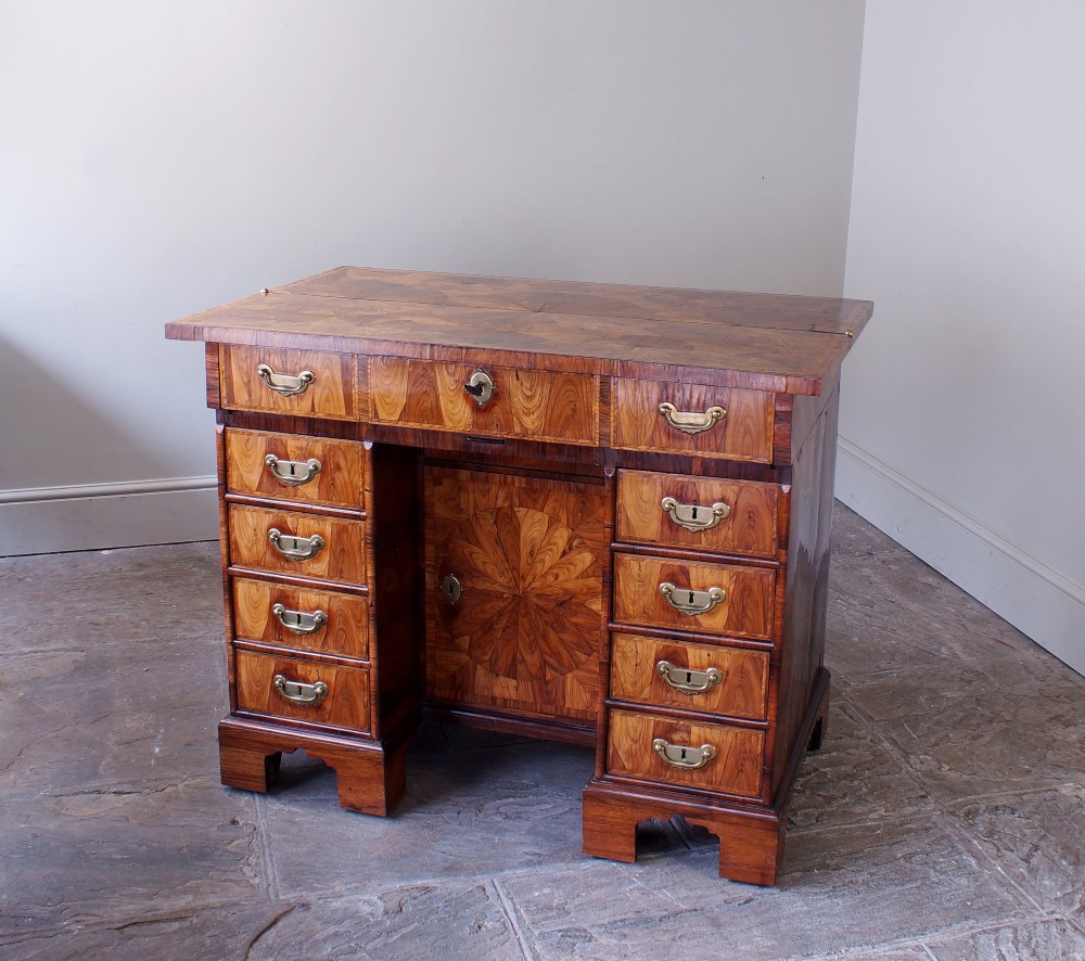 A William and Mary Kingwood oyster veneered kneehole secretaire desk View III