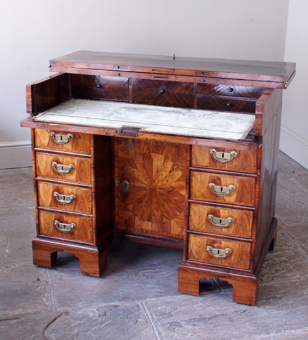 A William and Mary Kingwood oyster veneered kneehole secretaire desk View IV