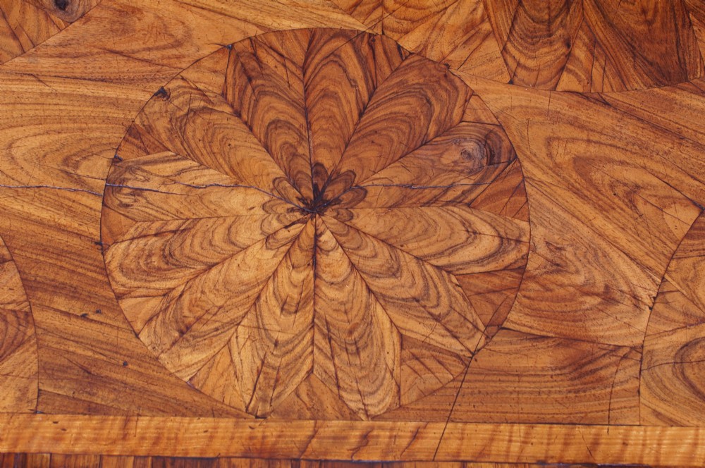 A William and Mary Kingwood oyster veneered kneehole secretaire desk View X