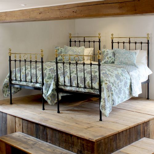 Pair of Black Cast Iron Antique Beds with Rings