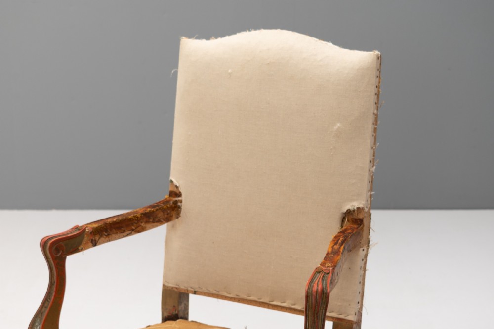 A set of six French gilded dining chairs featuring carved wooden frames, high backrests, and curved cabriole legs. View V