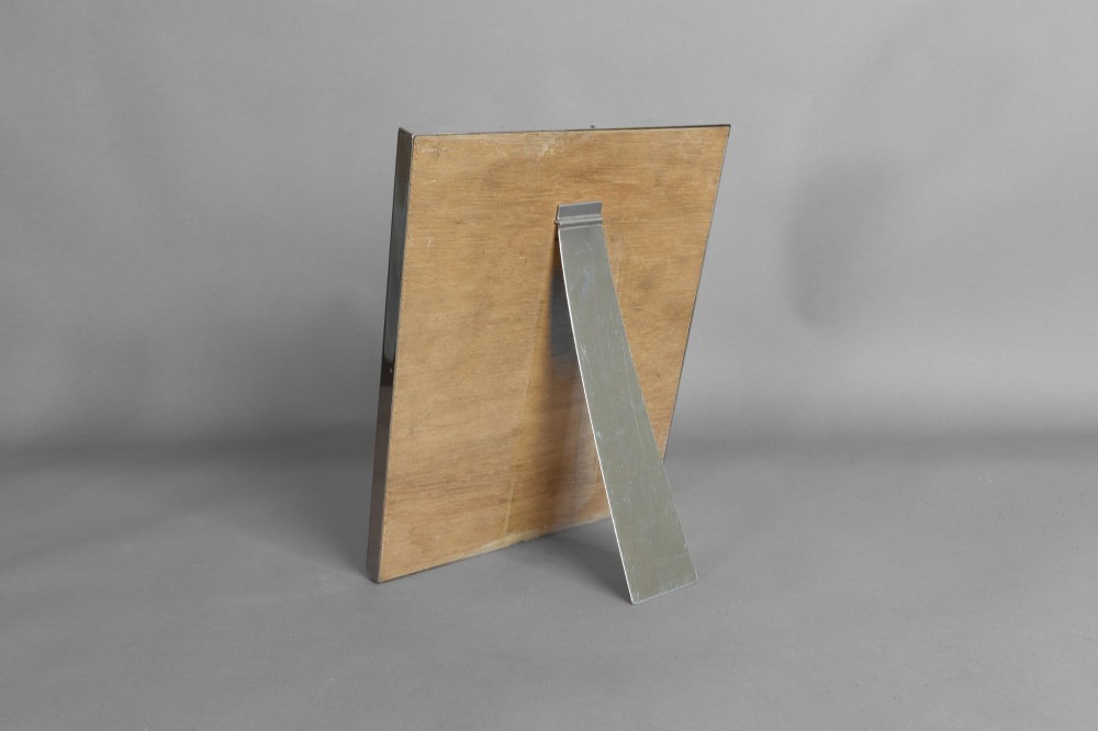 A rectangular silver-plated vanity mirror featuring a bevelled glass edge and an easel back support. View V