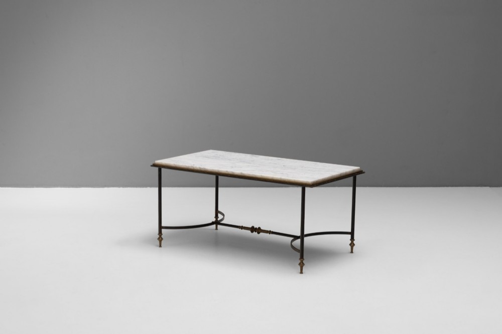 A rectangular coffee table featuring a polished white marble top set upon a black wrought iron frame with curved stretchers and brass finial feet. View III