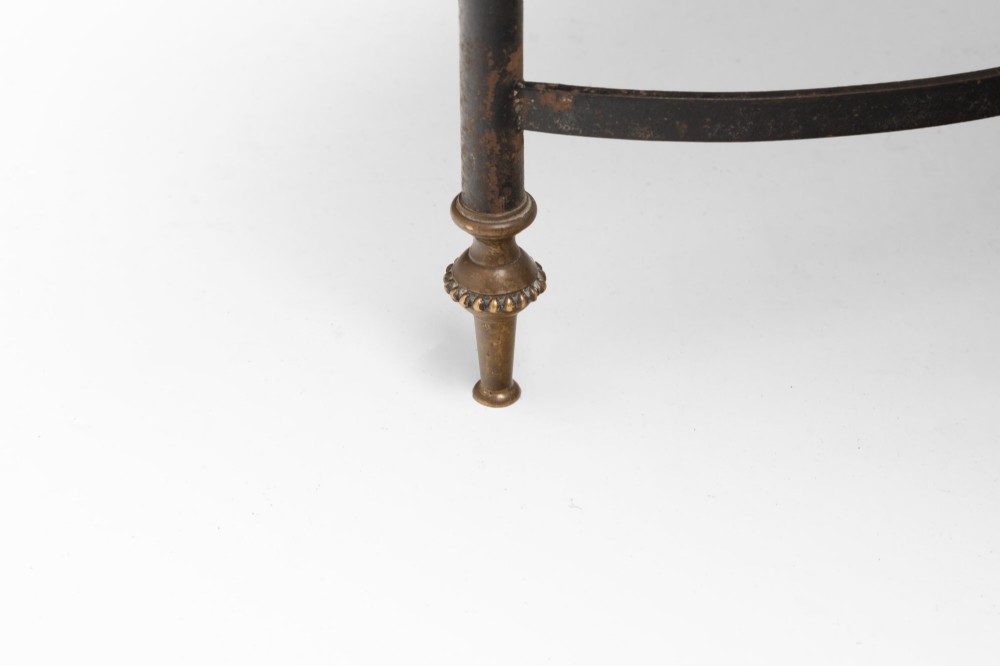 A rectangular coffee table featuring a polished white marble top set upon a black wrought iron frame with curved stretchers and brass finial feet. View VIII
