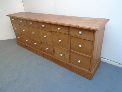 A WAXED 18 DRAWER VICTORIAN ANTIQUE OLD PINE BANK OF DRAWERS
