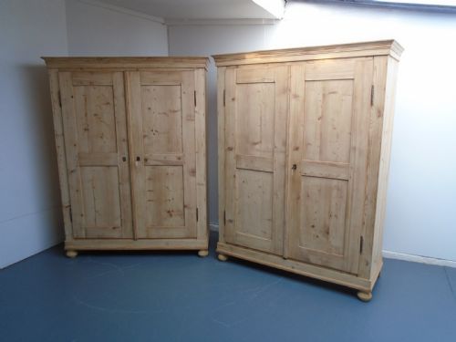 A RARE PAIR OF GEORGIAN ANTIQUE OLD PINE KNOCKDOWN WARDROBES TO WAX PAINT