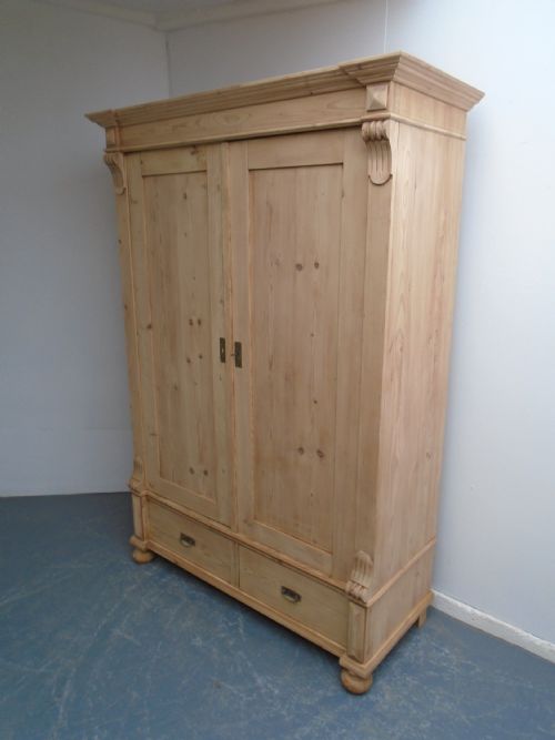 A PLAIN VICTORIAN SHELVED ANTIQUE PINE LINEN KNOCKDOWN WARDROBE TO WAXPAINT