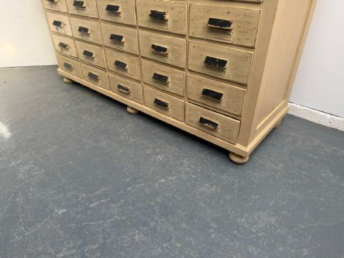 AN ORIGINALLY PAINTED CREAM HUNGARIAN VICTORIAN PINE 25 DRAWER SHOP FITTING - ADDITIONAL PHOTO 2
