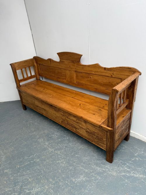 A RARE GEORGIAN COUNTRY PRIMITIVE HUNGARIAN WAXED 3 SEATER BOX SETTLE