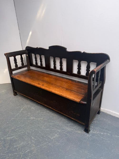 A GEORGIAN ORIGINAL HUNGARIAN PAINTED BLACK ANTIQUE PINE 3 SEATER BENCH