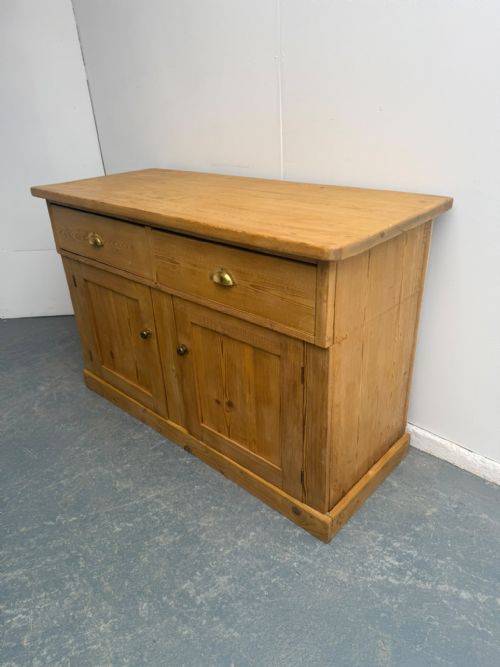 A CLASSIC ENGLISH VICTORIAN ANTIQUE PINE WAXED WIDE 2 DOOR 2 DRAWER DRESSER BASE