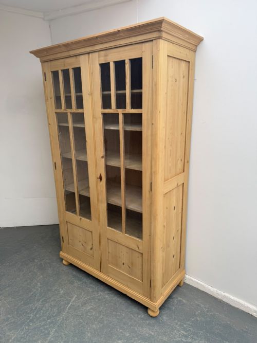 A HUGE VICTORIAN ANTIQUE OLD PINE GLAZED DISPLAY CABINET TO WAX PAINT