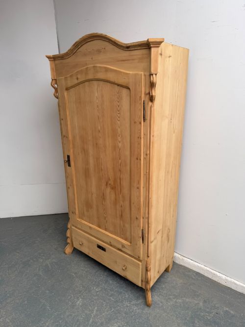 AN EARLY VICTORIAN ARCHED ANTIQUE OLD PINE STORAGE CUPBOARD TO WAXPAINT